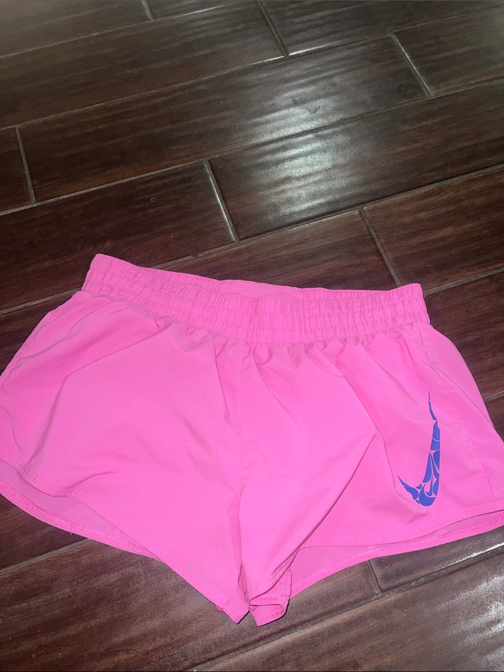 Nike Women's Hot Pink Athletic Shorts with Blue Swoosh